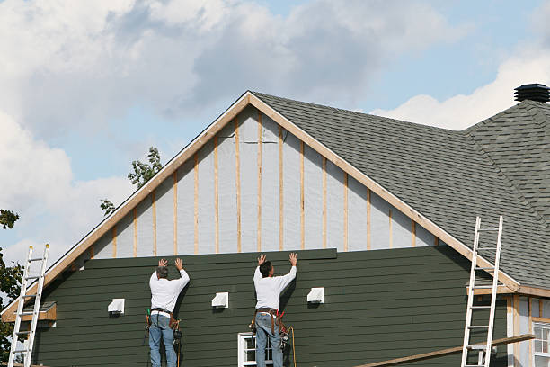 Professional Emergency Siding Repair technician working in Great River, NY